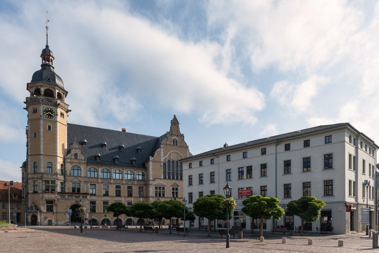 A picturesque view of the historic town hall in K&ouml;then, showcasing Gothic architecture.